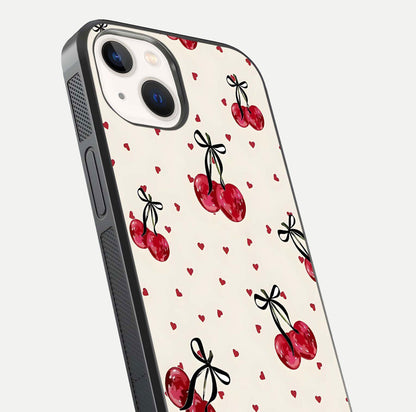 Cherry Heart Bow Glass Case for iPhone 14 close-up highlighting small bows, cherry red tones, and gloss shine