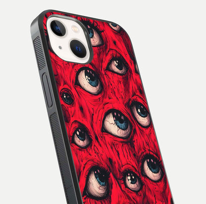 Crimson Watch Eyes Glass Case for iPhone 14 close-up highlighting graphic detail and reflection