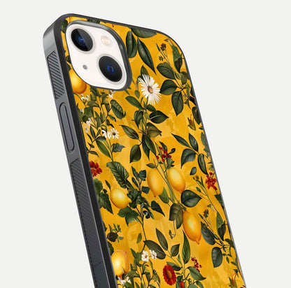 Golden Lemon Field Glass Case for iPhone 14 close-up angled shot showing citrus texture and reflection brilliance