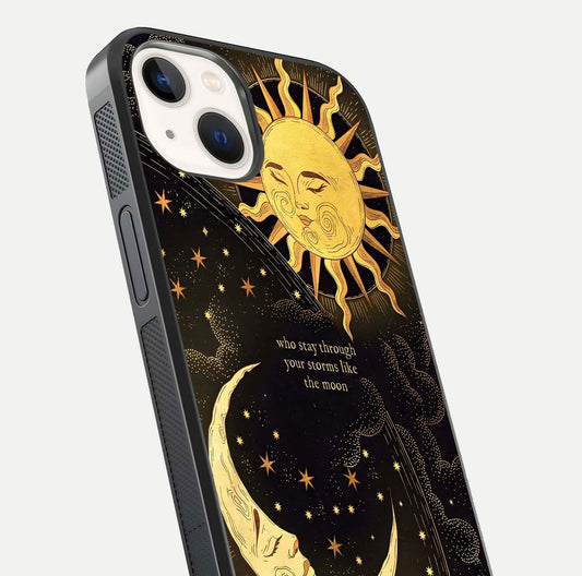 Golden Lunar Love Glass Case for iPhone 14 close-up angled shot showing moon glow, texture, and reflection polish