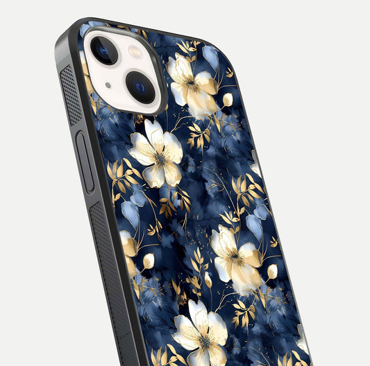 Golden Midnight Bloom Glass Case for iPhone 14 close-up angled shot showing floral detail and reflection shine