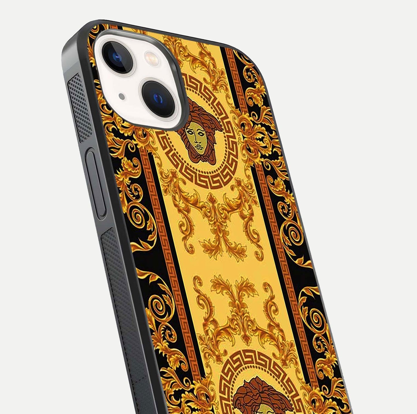 Golden Royal Heritage Glass Case for iPhone 14 close-up angled shot showing intricate design and metallic reflection