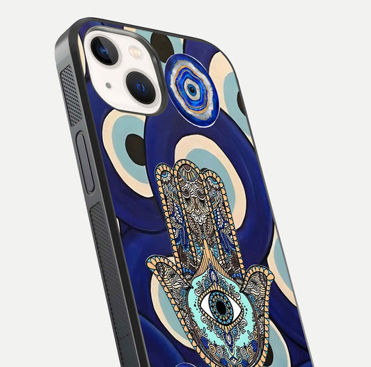 Hamsa Divine Guard Glass Case for iPhone 14 close-up angled shot showing detailed palm motif and reflection glow