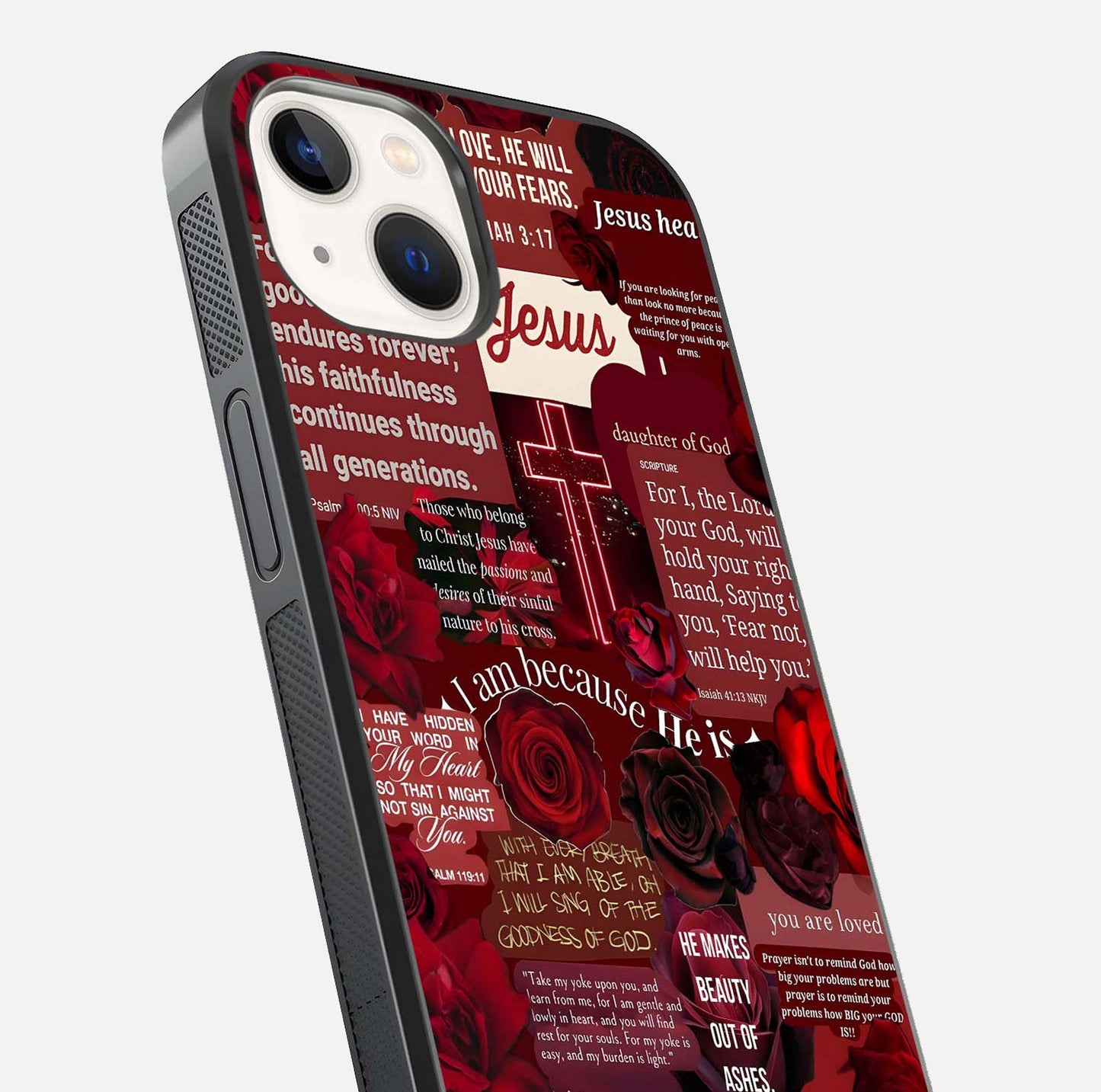 Jesus Love Heals Glass Case for iPhone 14 close-up angled shot showing healing text, cross detailing, and reflection