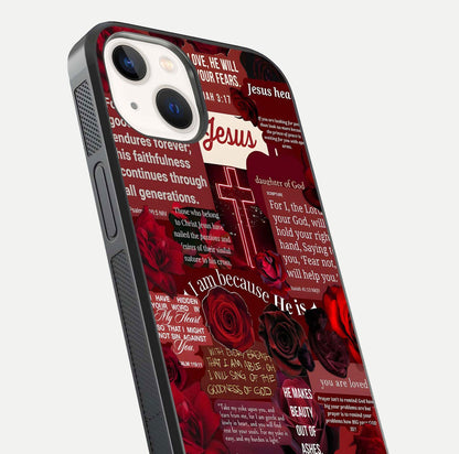Jesus Love Heals Glass Case for iPhone 14 close-up angled shot showing healing text, cross detailing, and reflection