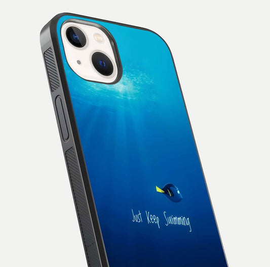 Just Keep Swimming Glass Case for iPhone 14 close-up angled shot showing elegant lettering and blue tone reflection