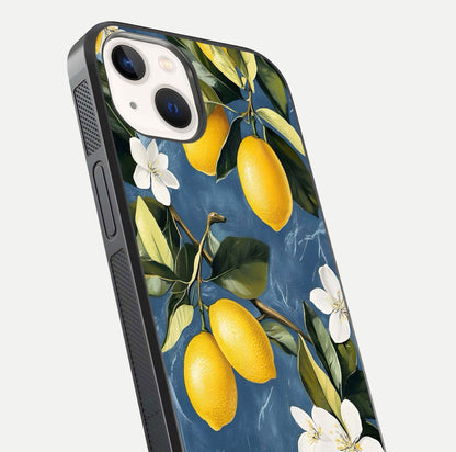 Lemon Dream Garden Glass Case for iPhone 14 close-up angled shot showing fruit details and shine reflection