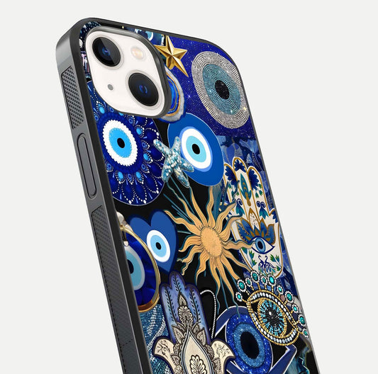 Mystic Blue Evil Eye Glass Case for iPhone 14 close-up angled shot highlighting mystical glow and HD reflection
