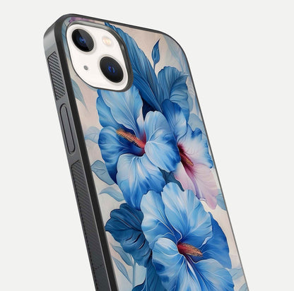 Ocean Hibiscus Grace Glass Case for iPhone 14 close-up angled shot highlighting floral glow and HD shine