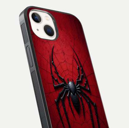 Venom Web Emblem Glass Case for iPhone 14 close-up angled shot highlighting sharp logo lines and reflection