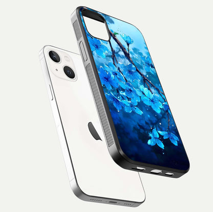 Blue Blossoms Branch Glass Case for iPhone 16 Pro floating mockup showing shine, curved edges, and branch detailing