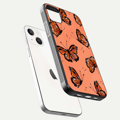 Coral Wing Butterfly Glass Case for iPhone 14 Plus floating mockup showing HD gloss texture and vivid coral color