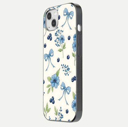 Blue Flower & Bow Glass Case for iPhone 14 Plus side-angle image showing bow-floral mix and HD finish shine