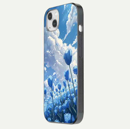 Blue Tulip Clouds Glass Case for iPhone 14 Plus side-angle image showing edge curve and flower reflection glow