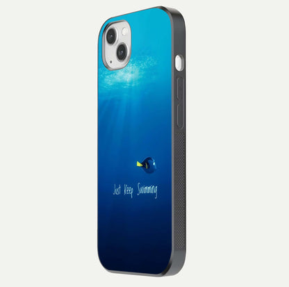 Just Keep Swimming Glass Case for iPhone 14 Plus side-angle image highlighting reflective surface and positive quote