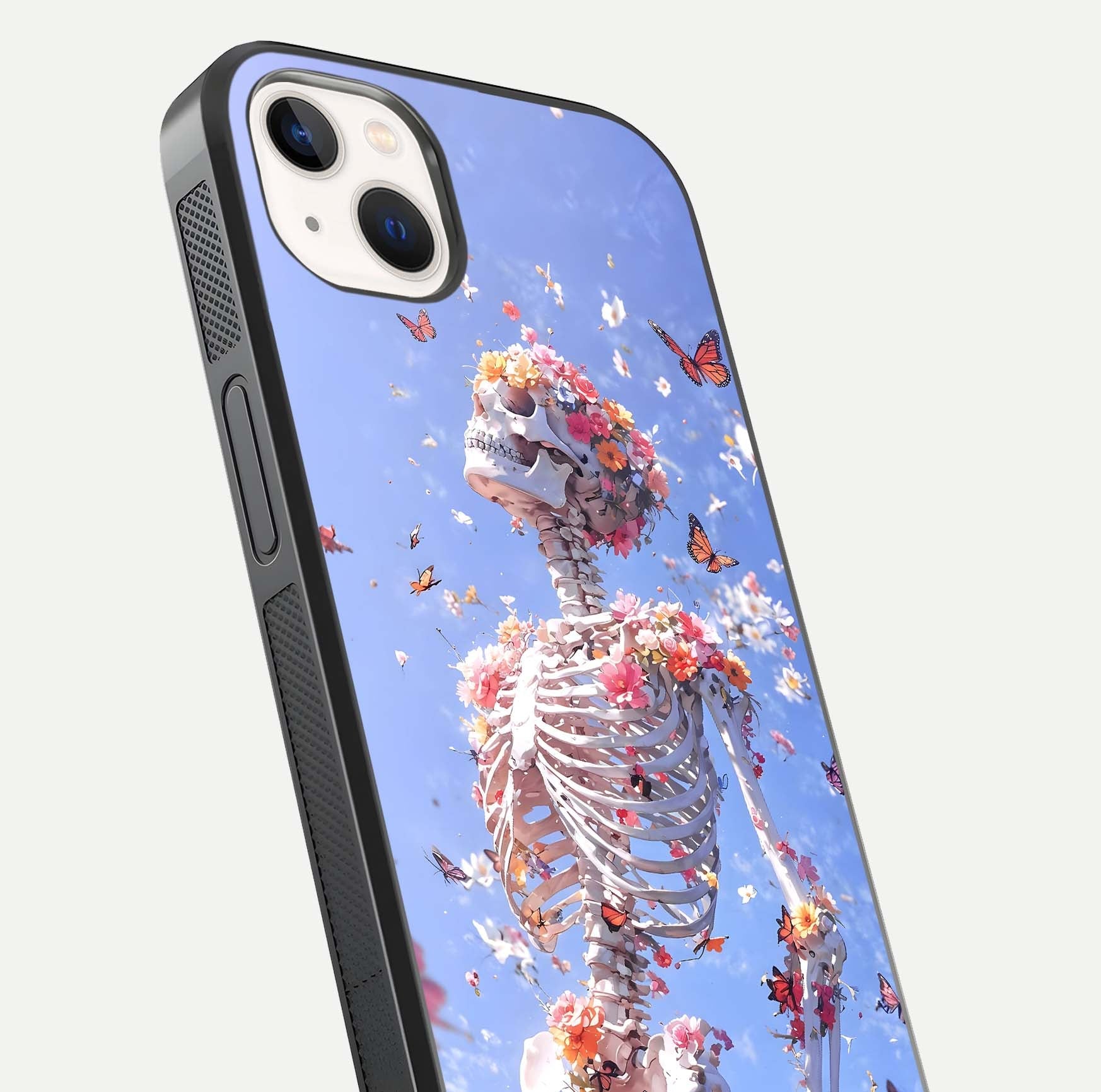 Bloom Beyond Bones Glass Case for iPhone 14 Plus close-up highlighting unique bone-floral fusion art and reflection