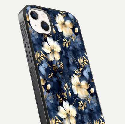 Golden Midnight Bloom Glass Case for iPhone 14 Plus close-up angled shot showing floral detail and reflection shine