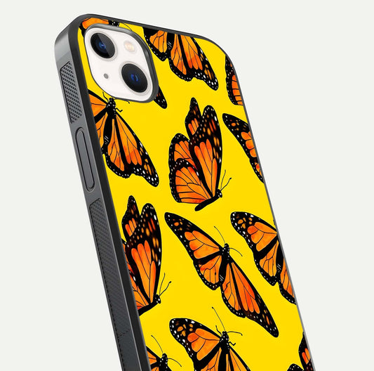 Golden Wing Flight Glass Case for iPhone 14 Plus close-up angled shot showing metallic wing texture and shine detail