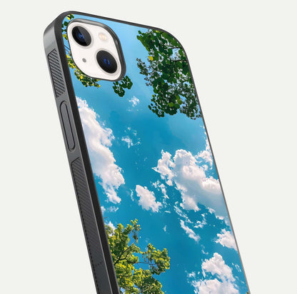 Greenery Sky Glass Case for iPhone 14 Plus close-up angled shot showing leafy tones and reflection brightness