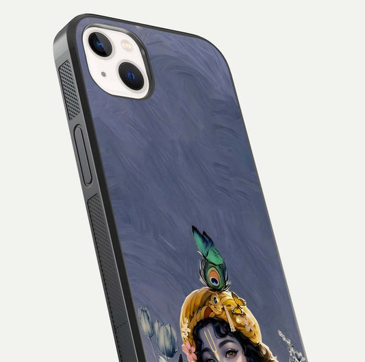 Lord Krishna Glass Case for iPhone 14 Plus angled close-up showing intricate flute and reflection details