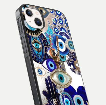 Mystic Charm Eye Glass Case for iPhone 14 Plus close-up angled shot showing detailed eye art and reflection