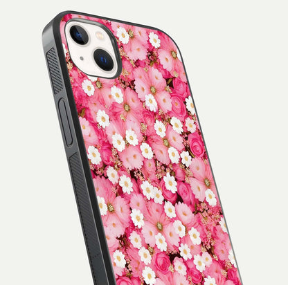 Pink Daisy Bliss Glass Case for iPhone 14 Plus close-up angled shot highlighting daisy detail and reflection glow
