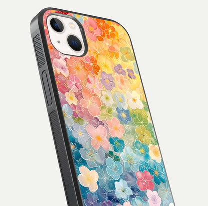 Rainbow Blossom Burst Glass Case for iPhone 14 Plus close-up angled shot showing petal colors and reflection