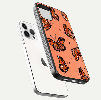 Coral Wing Butterfly Glass Case for iPhone 14 Pro floating mockup showing HD gloss texture and vivid coral color