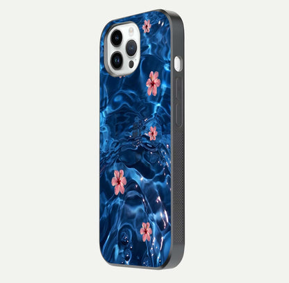 Blooming Water Drift Glass Case for iPhone 16 Pro side-angle image showcasing blossom flow, curved corners, and HD glass gloss