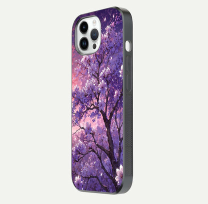 Blossom Tree Glass Case for iPhone 14 Pro side-angle image showing floral tree artwork and reflection gloss