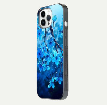 Blue Blossoms Branch Glass Case for iPhone 16 Pro side-angle image showing blossom pattern flow and glossy texture