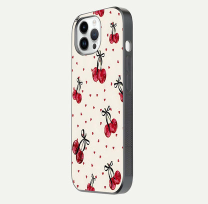 Cherry Heart Bow Glass Case for iPhone 14 Pro side-angle image capturing gloss texture and charm bow art