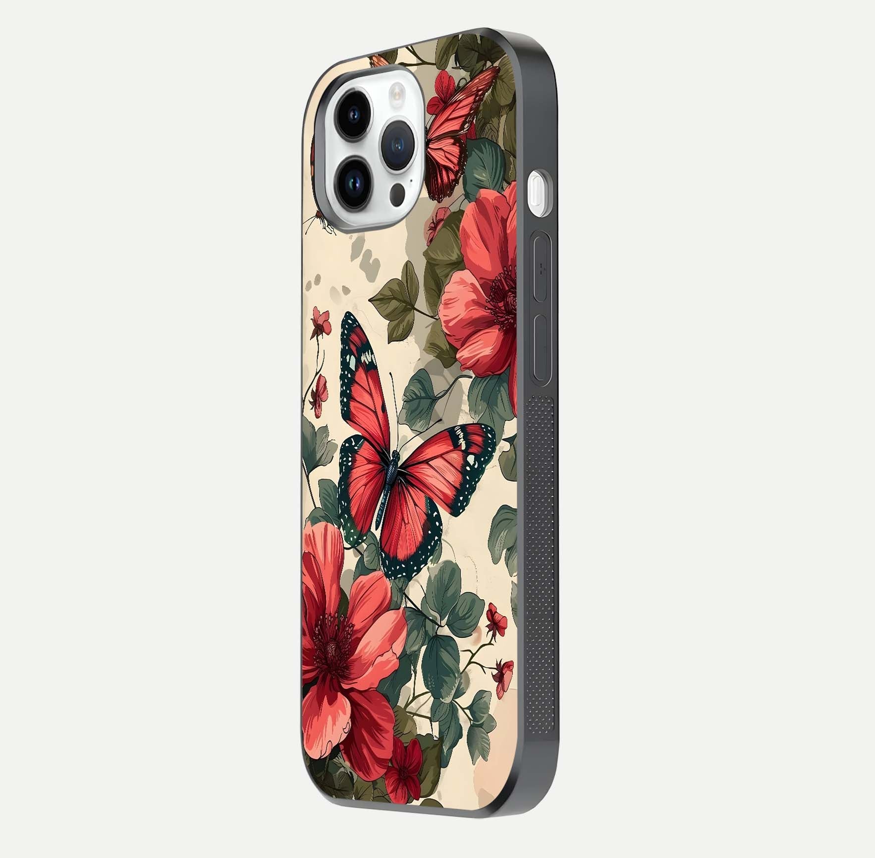 Crimson Butterfly Garden Glass Case for iPhone 14 Pro side-angle photo capturing gloss texture and soft tone
