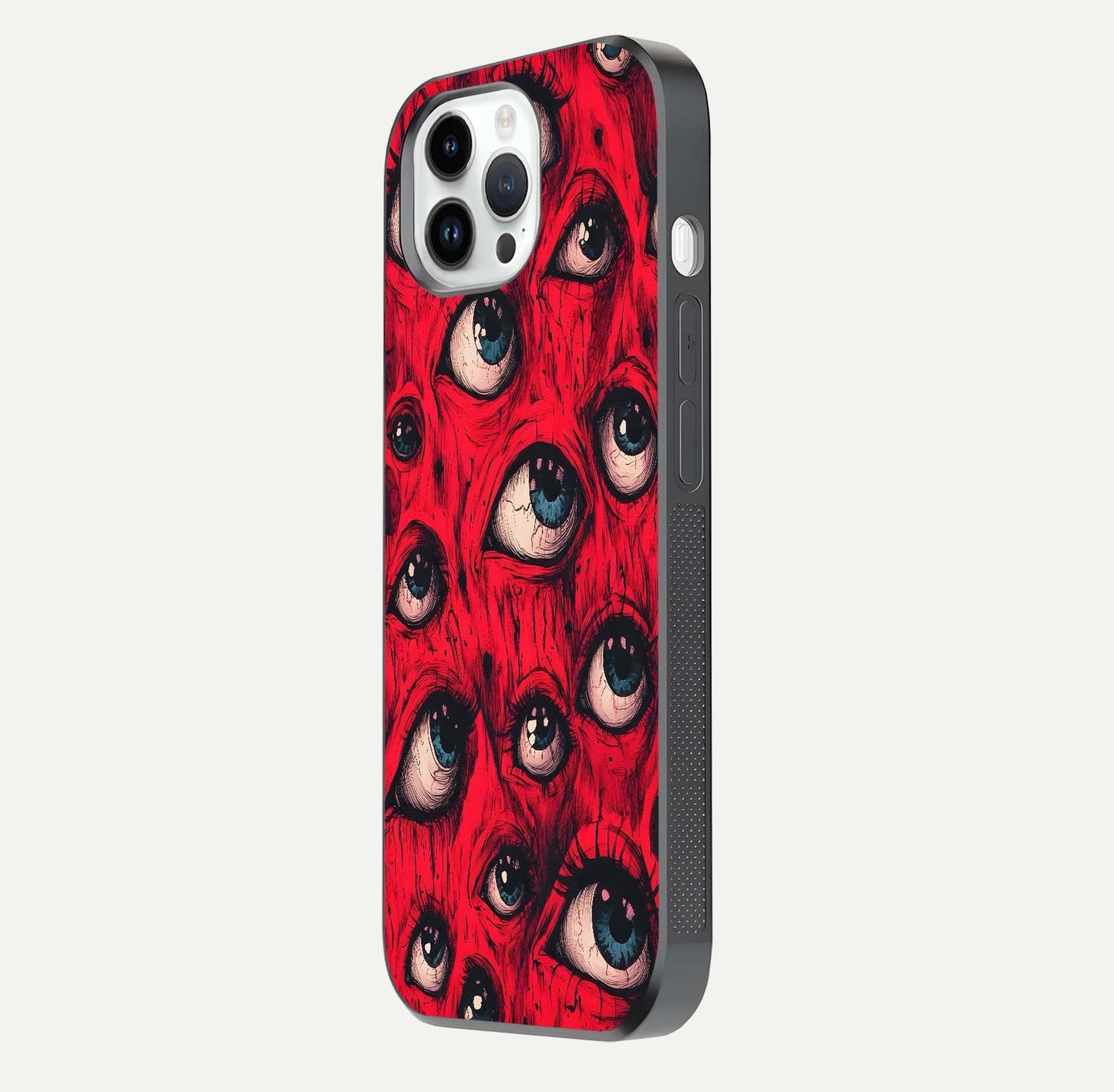 Crimson Watch Eyes Glass Case for iPhone 14 Pro side-angle photo showing reflection texture and shine