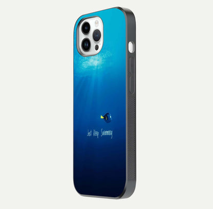 Just Keep Swimming Glass Case for iPhone 14 Pro side-angle image highlighting reflective surface and positive quote