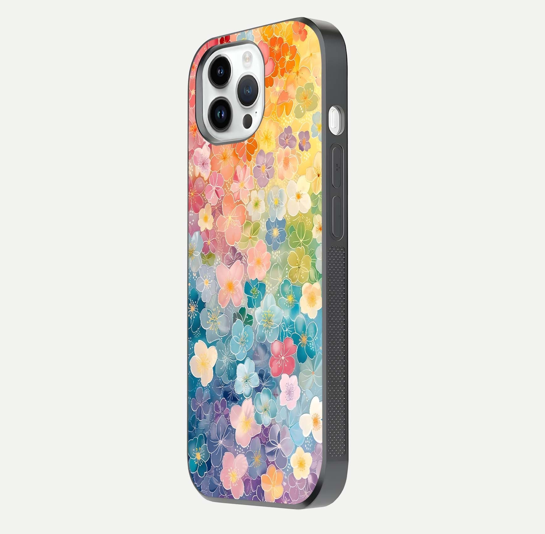 Rainbow Blossom Burst Glass Case for iPhone 14 Pro side-angle image showing reflection and floral burst detail