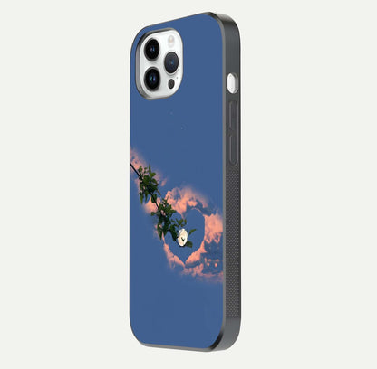 Sky Under Tree Glass Case for iPhone 14 Pro side-angle image showing shine, edge texture, and scenic detail