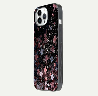 Starlit Flower Dreams Glass Case for iPhone 14 Pro side-angle image showing shine, edge detail, and floral contrast