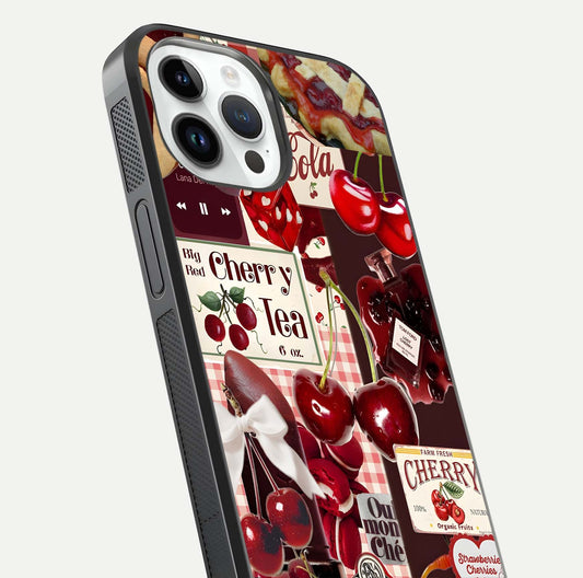 Aesthetic Cherry Tea Glass Case for iPhone 14 Pro close-up angled shot showing detailed cherry artwork, red tones, and gloss reflection