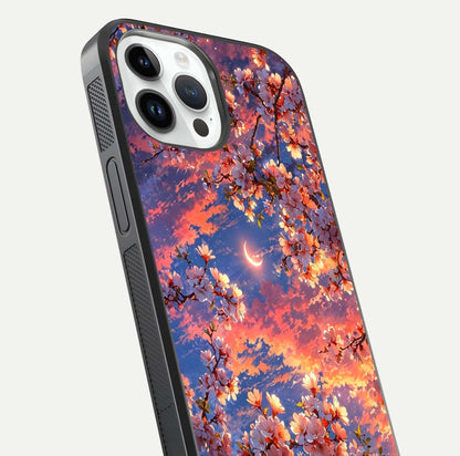 Celestial Sakura Sunset Glass Case for iPhone 14 Pro close-up image highlighting blossom petals and gloss shine