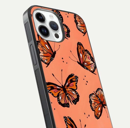 Coral Wing Butterfly Glass Case for iPhone 14 Pro close-up highlighting wing pattern, coral tones, and reflection shine