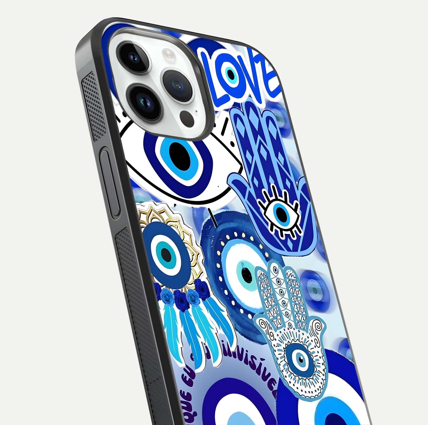 Evil Eyes Dream Glass Case for iPhone 14 Pro close-up highlighting evil-eye charm detail and light reflection on glass