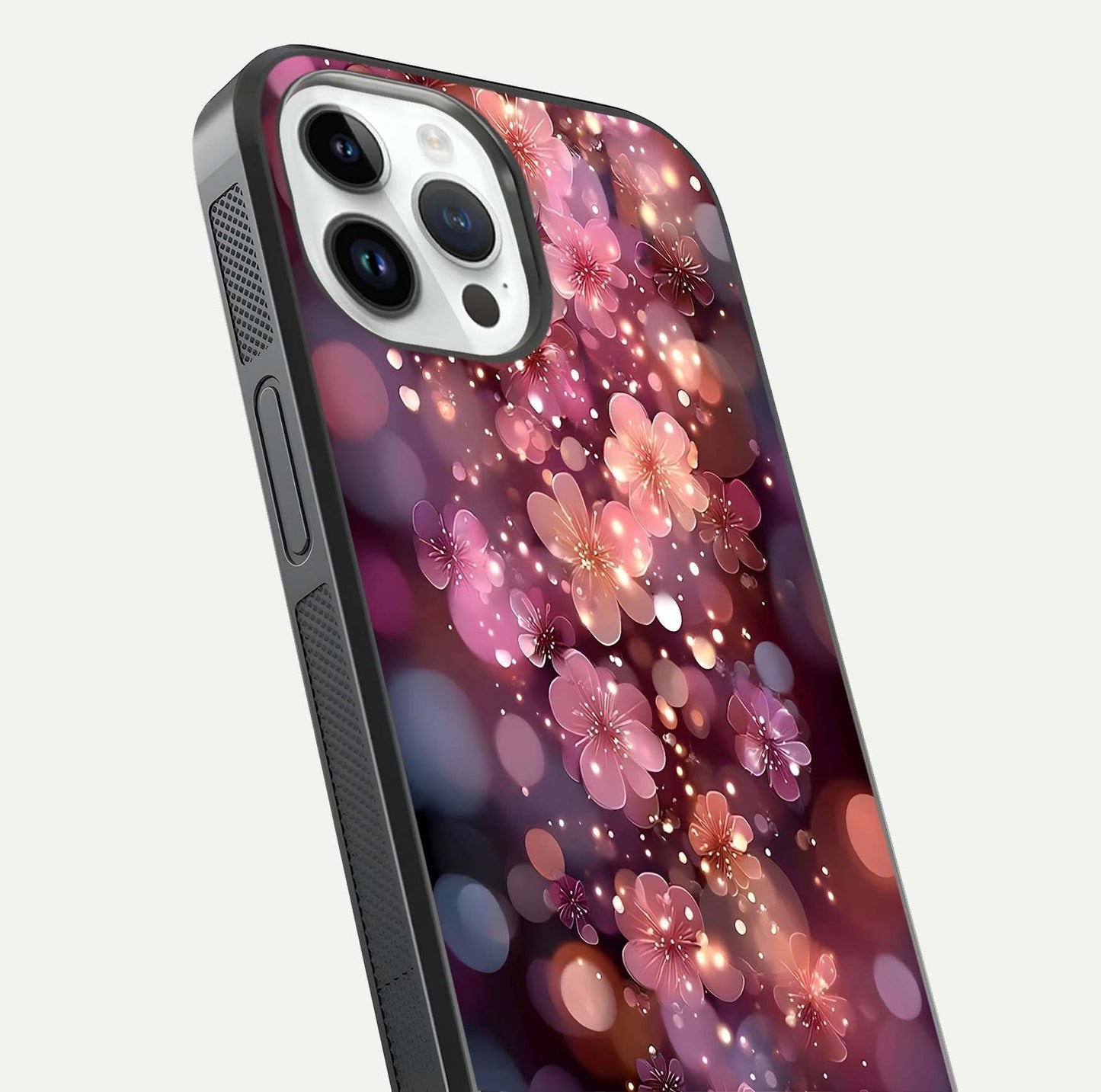 Glowing Petal Bliss Glass Case for iPhone 14 Pro close-up angled shot showing petal glow, color depth, and reflection shine