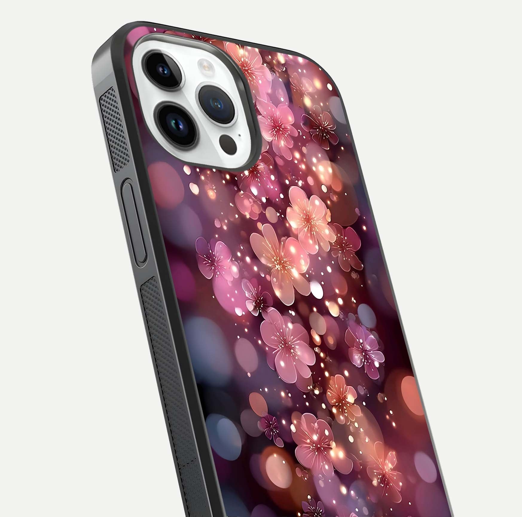 Glowing Petal Bliss Glass Case for iPhone 14 Pro close-up angled shot showing petal glow, color depth, and reflection shine