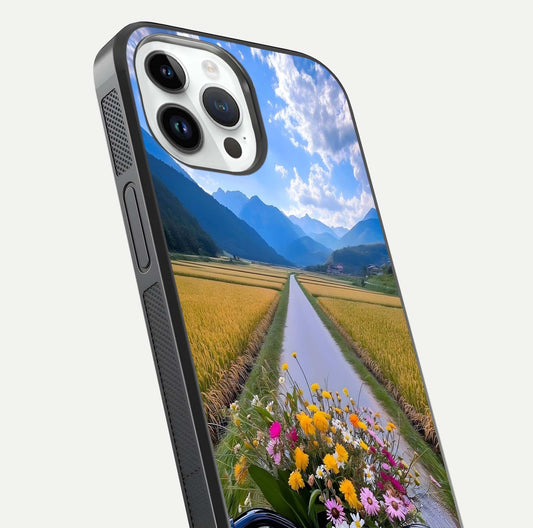 Golden Field Journey Glass Case for iPhone 14 Pro close-up angled shot showing sunlight tones and reflection clarity