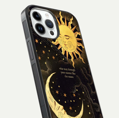 Golden Lunar Love Glass Case for iPhone 14 Pro close-up angled shot showing moon glow, texture, and reflection polish