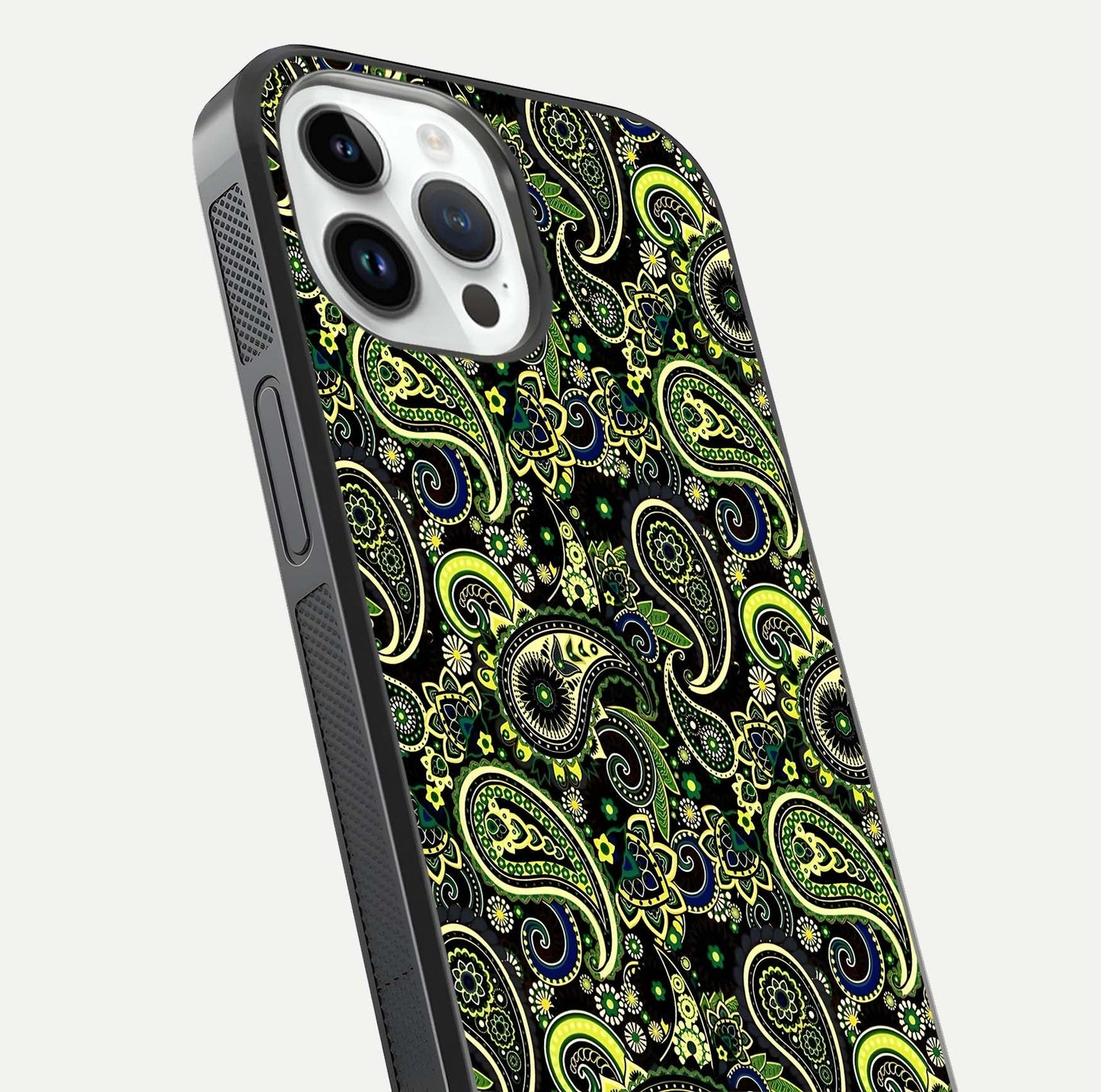 Green Mandala Pattern Glass Case for iPhone 14 Pro close-up angled shot showing fine detailing and gold-green reflection
