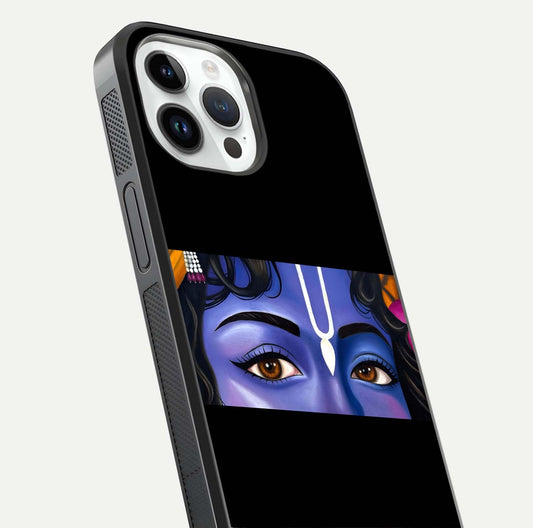 Krishna Eye Glass Case for iPhone 14 Pro close-up angled shot showing intricate artwork and reflection shine