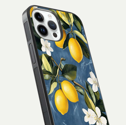Lemon Dream Garden Glass Case for iPhone 14 Pro close-up angled shot showing fruit details and shine reflection