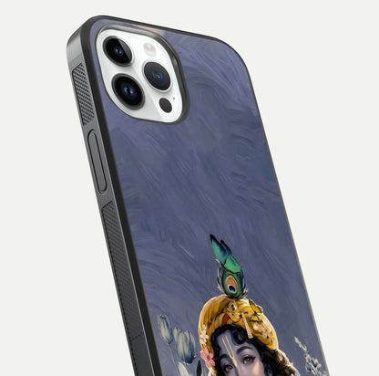 Lord Krishna Glass Case for iPhone 14 Pro angled close-up showing intricate flute and reflection details